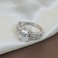 Regal Emerald Solitaire Diamond Ring